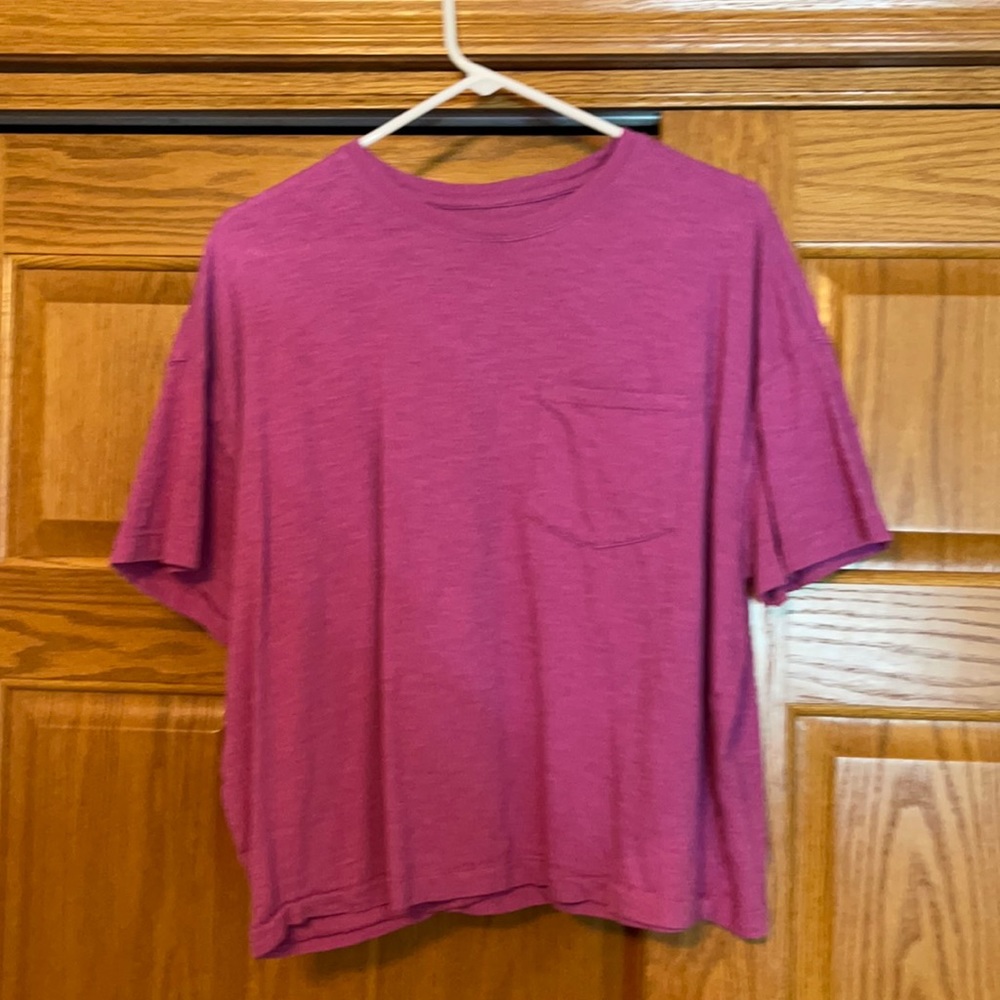 pink tee shirt with a pocket